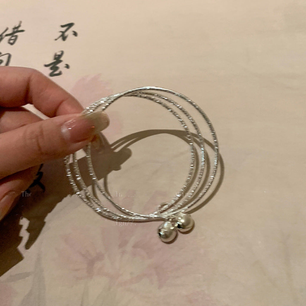 Multi-Loop Bell Pendant Bracelet