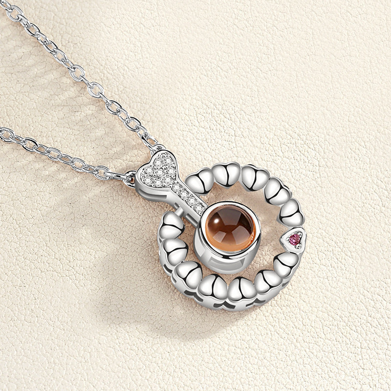 Multilingual Love Projection Necklace