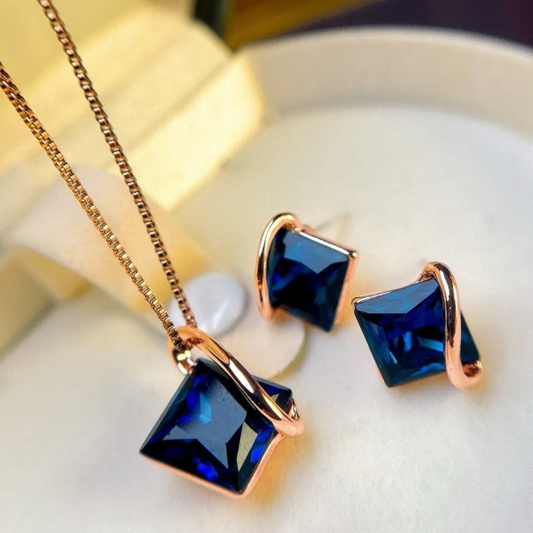 Niche Sapphire Blue Crystal Necklace and Stud Earrings