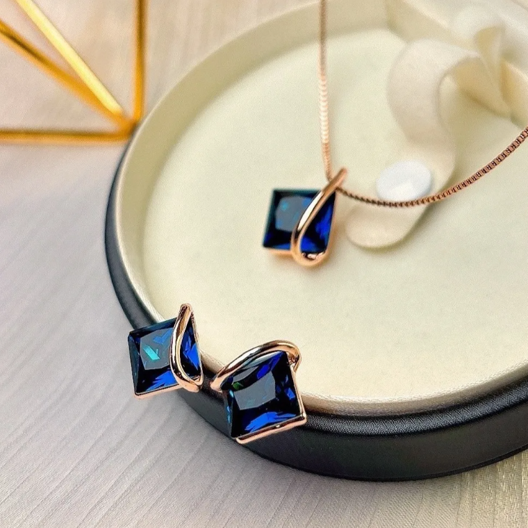 Niche Sapphire Blue Crystal Necklace and Stud Earrings