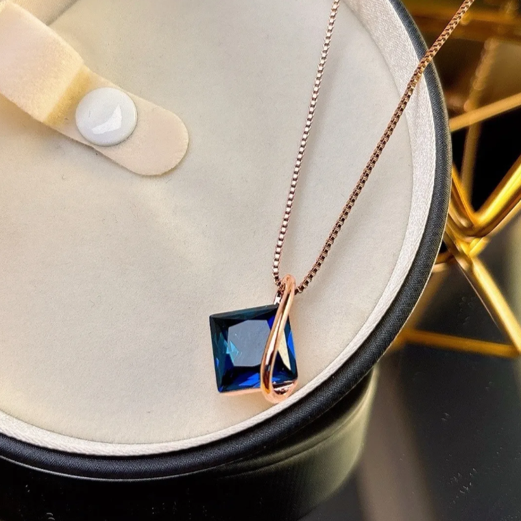 Niche Sapphire Blue Crystal Necklace and Stud Earrings