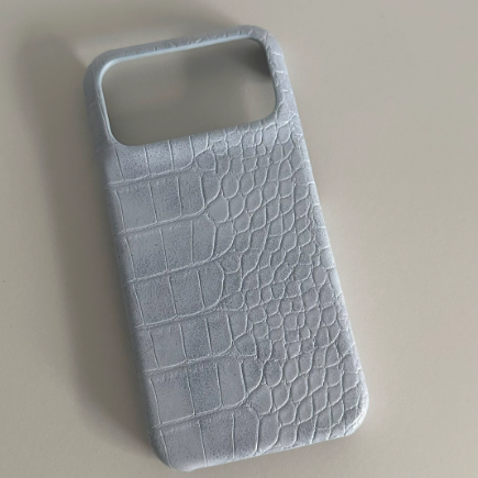 Niche-textured leather half-shell hard case