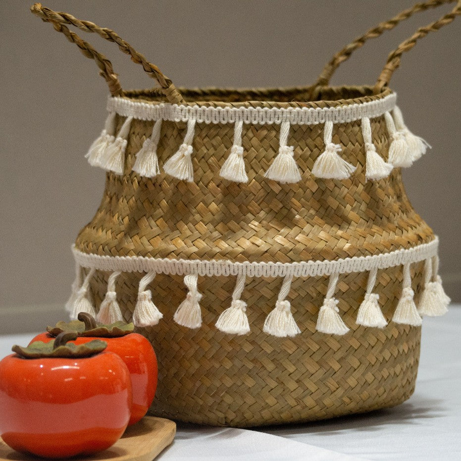 Nordic-style woven fringed seagrass basket