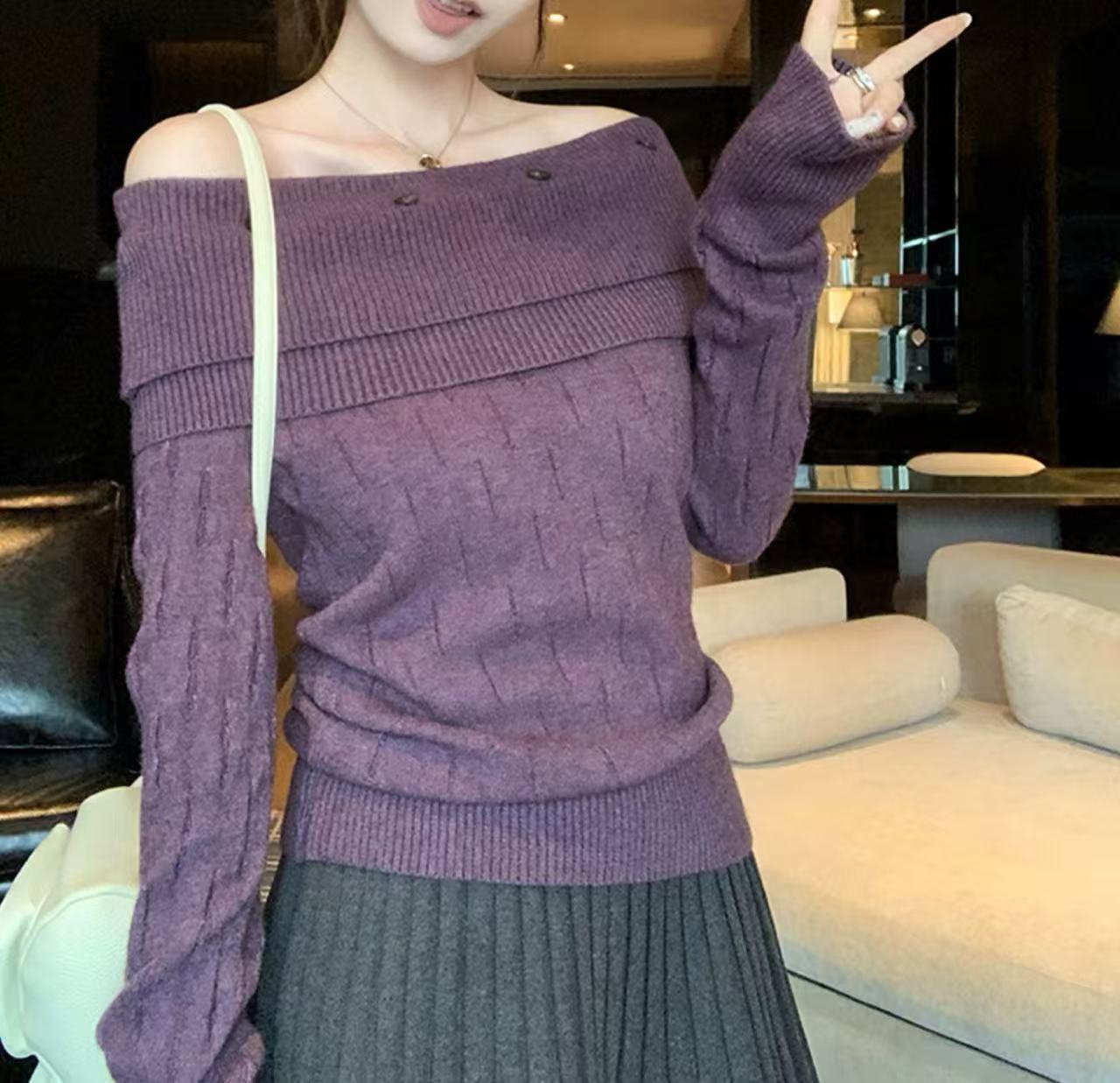 Off-the-shoulder long-sleeved knit top