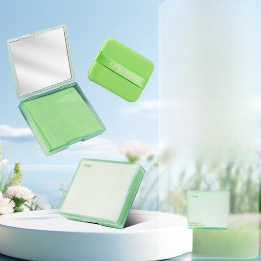 Oil absorbing paper