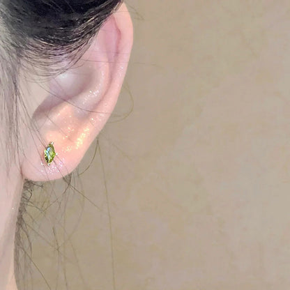 Olive green horse-eye stud earrings