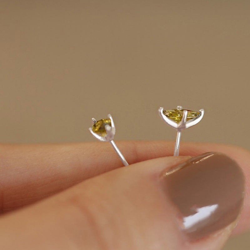 Olive green horse-eye stud earrings