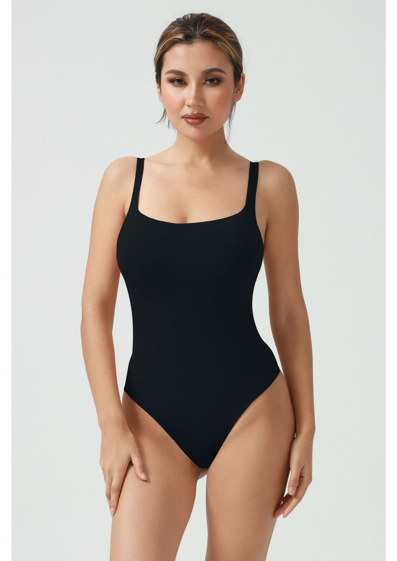 One-piece shaping garment