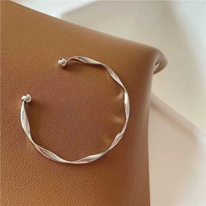 Open Twist Smooth Metal Bracelet