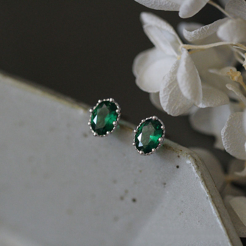 Oval Zircon Earrings with Gold Edge
