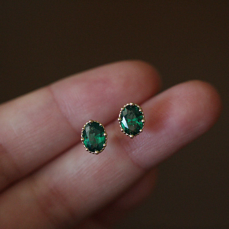 Oval Zircon Earrings with Gold Edge