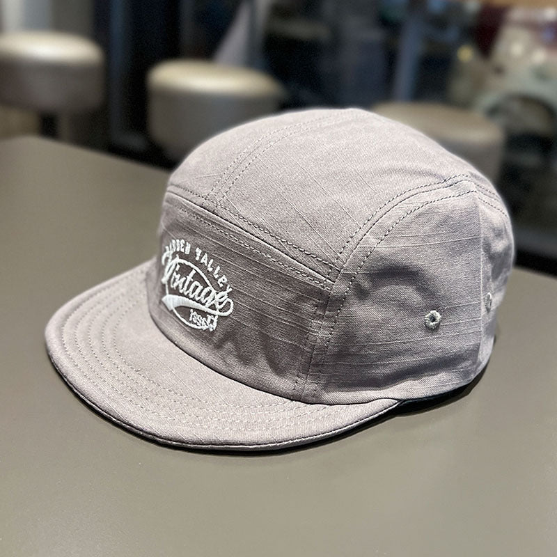 peaked cap