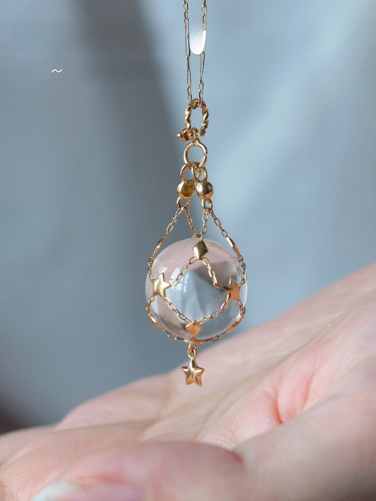 Pearl mesh crystal pendant