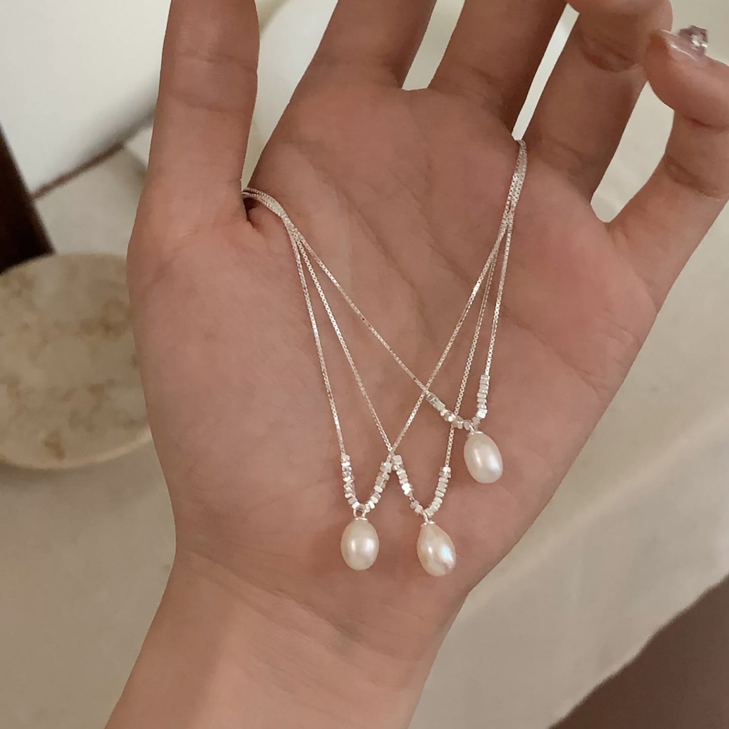 Pearl necklace with silver accents
