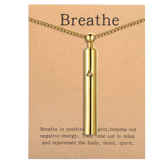 Pendant necklace with titanium and steel whistle