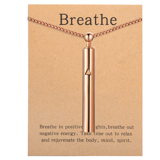 Pendant necklace with titanium and steel whistle