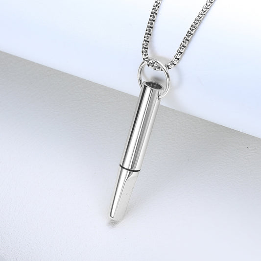Pendant necklace with titanium and steel whistle