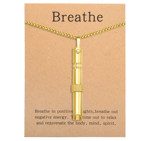 Pendant necklace with titanium and steel whistle