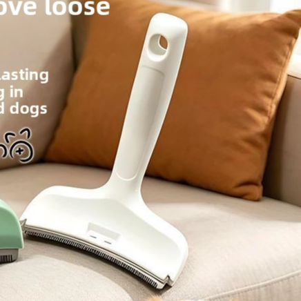 Pet grooming brush