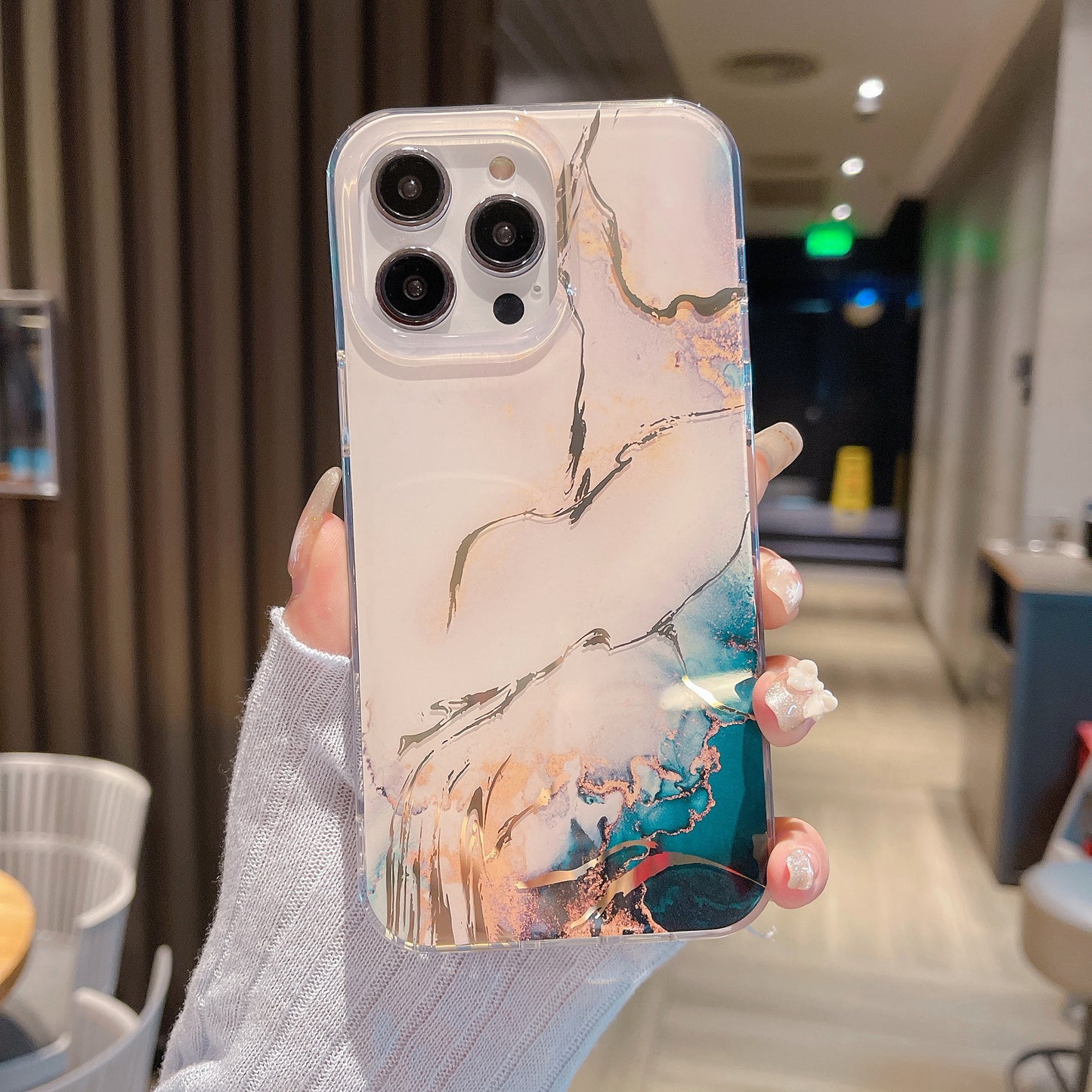 Phone with lustrous marble shell