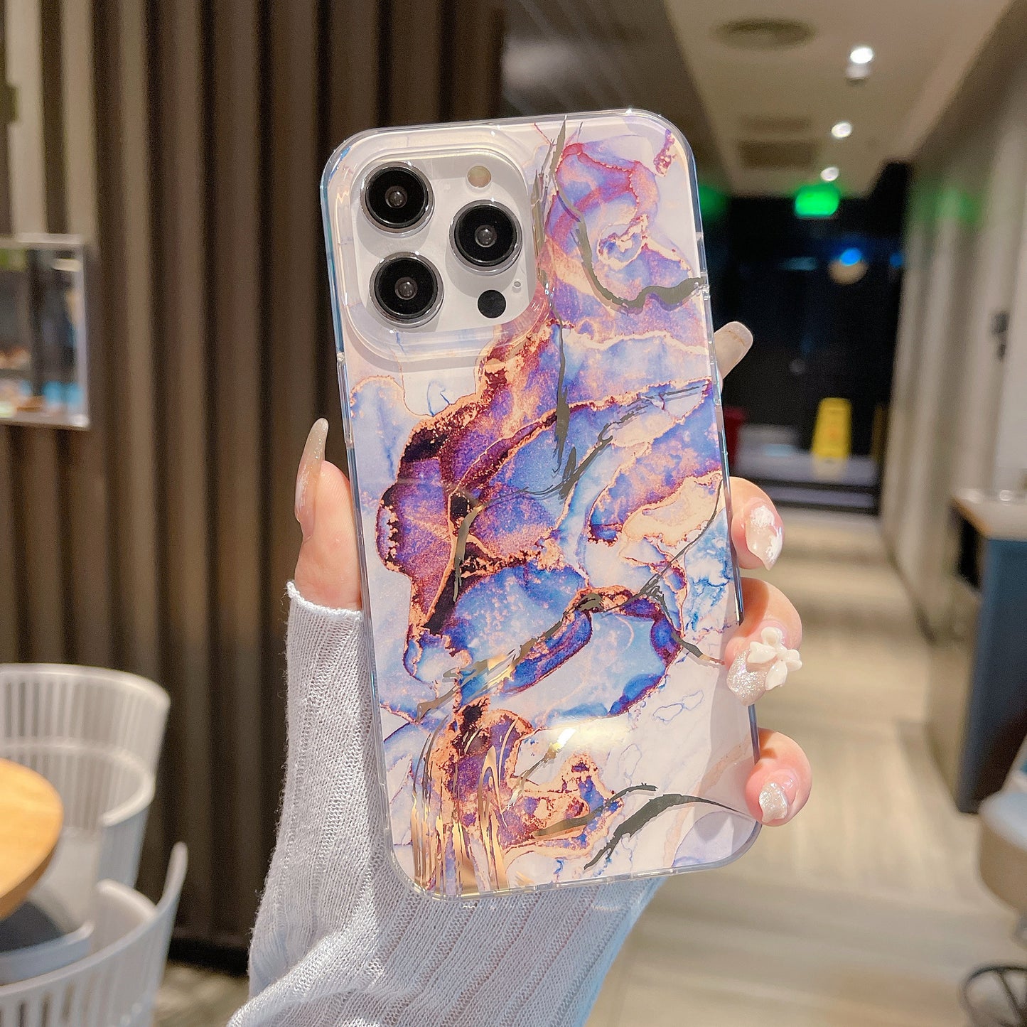 Phone with lustrous marble shell