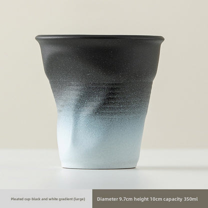 Pinch the ceramic pleated cup by hand