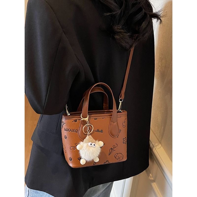 Pink Bucket Crossbody Bag with Pendant