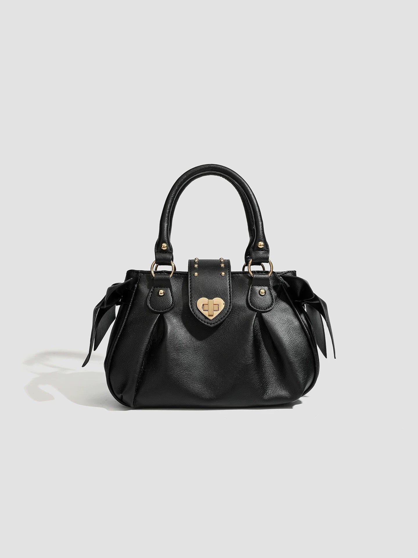 Pink pleated handbag