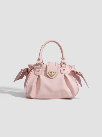 Pink pleated handbag