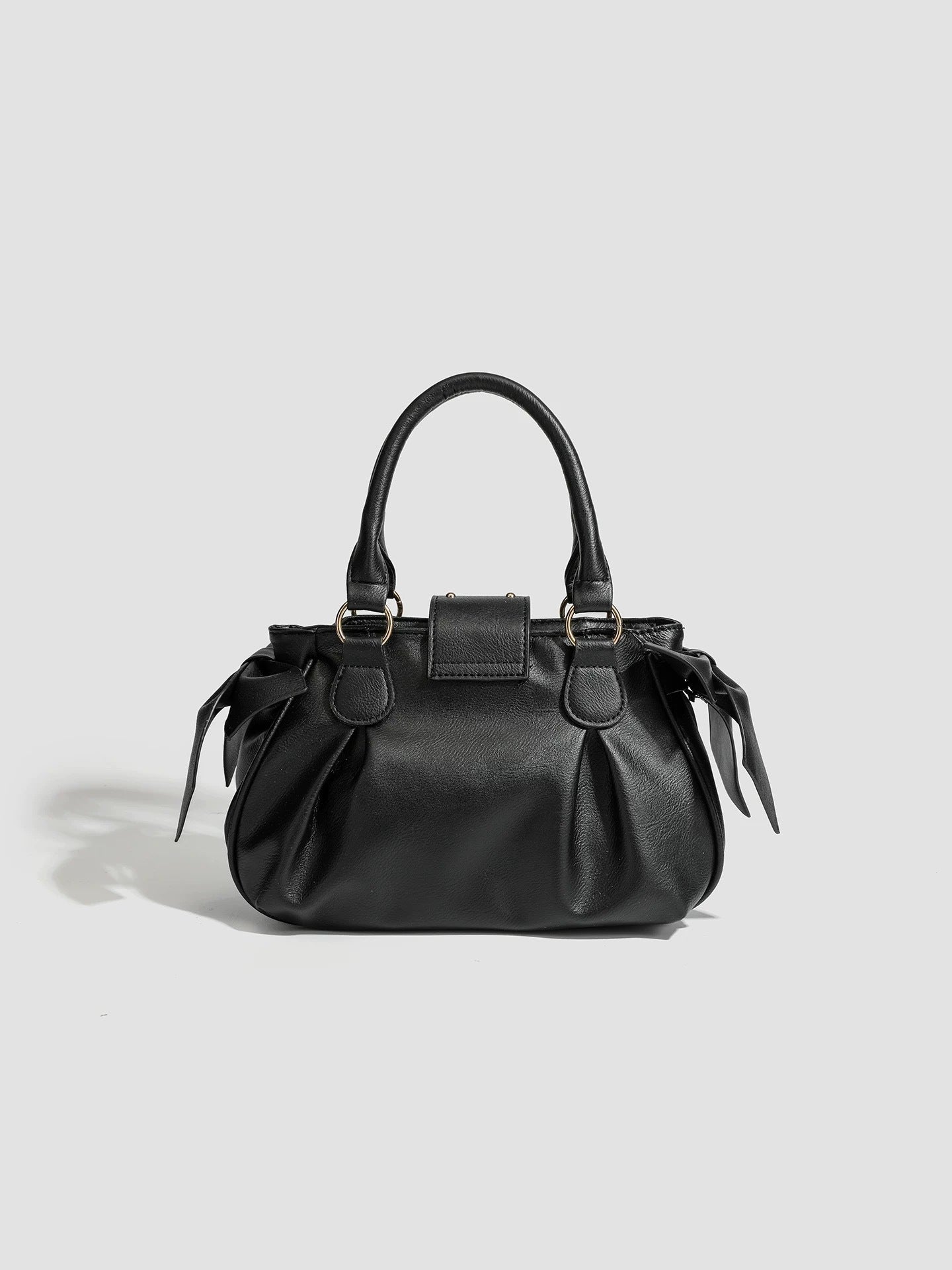 Pink pleated handbag