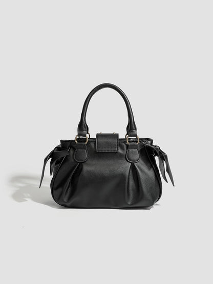 Pink pleated handbag