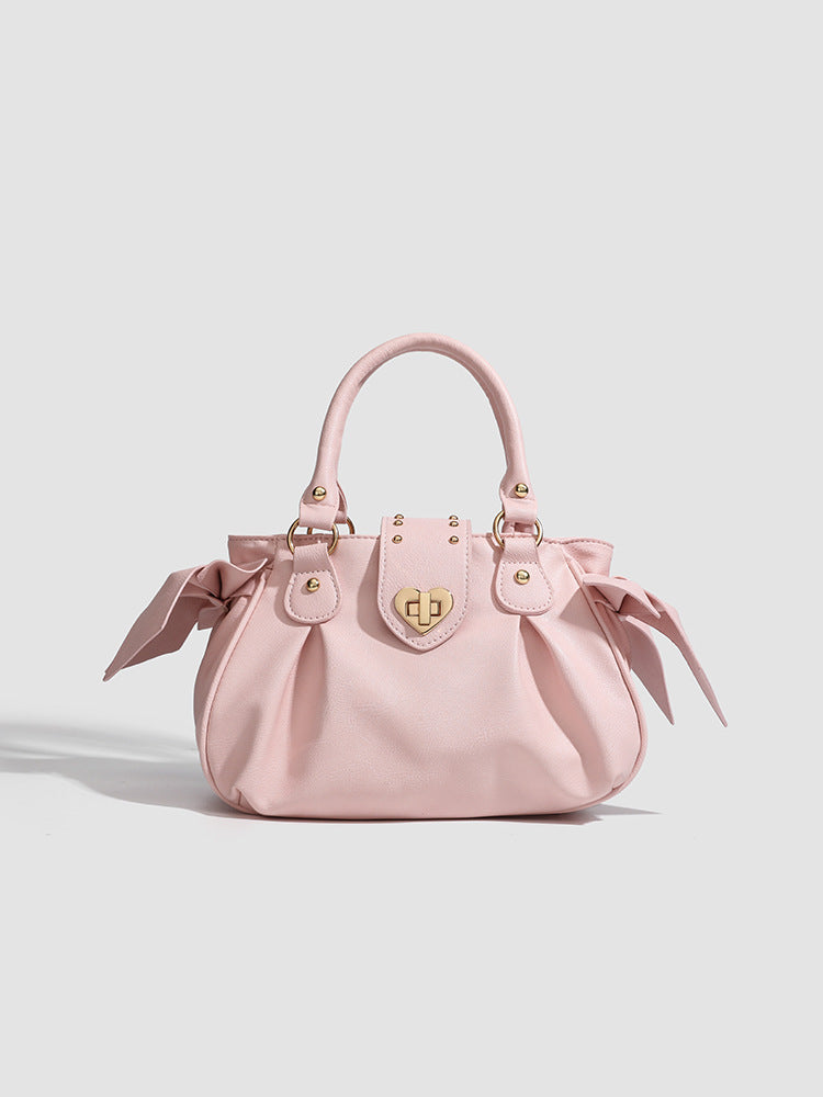 Pink pleated handbag