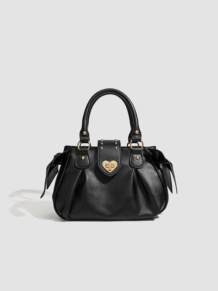 Pink pleated handbag
