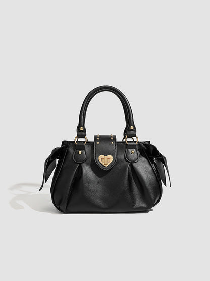 Pink pleated handbag