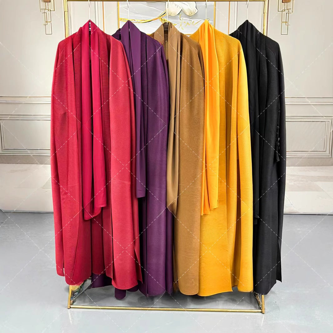 Pleated long-sleeved coat