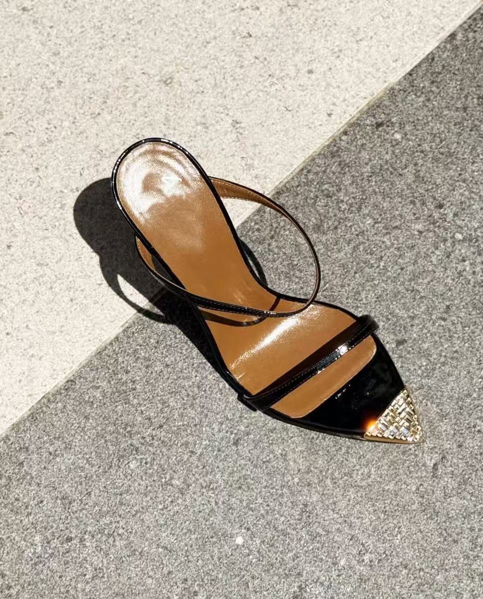 Pointed-toe rhinestone gold stilettos