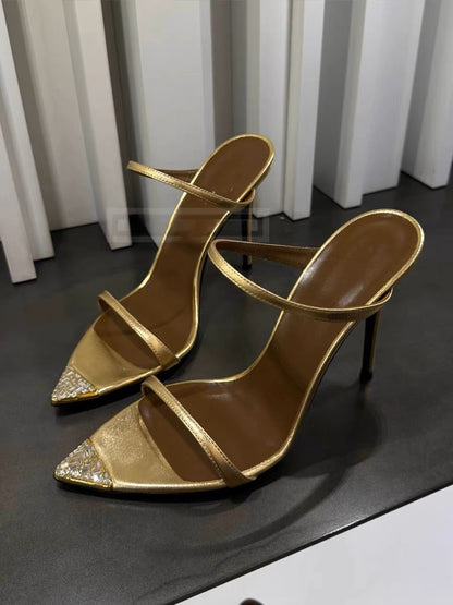 Pointed-toe rhinestone gold stilettos
