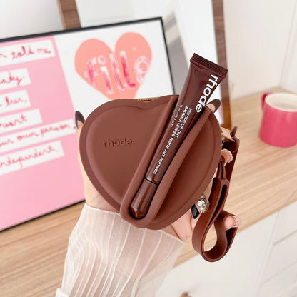 Portable coin purse with earphone compartment