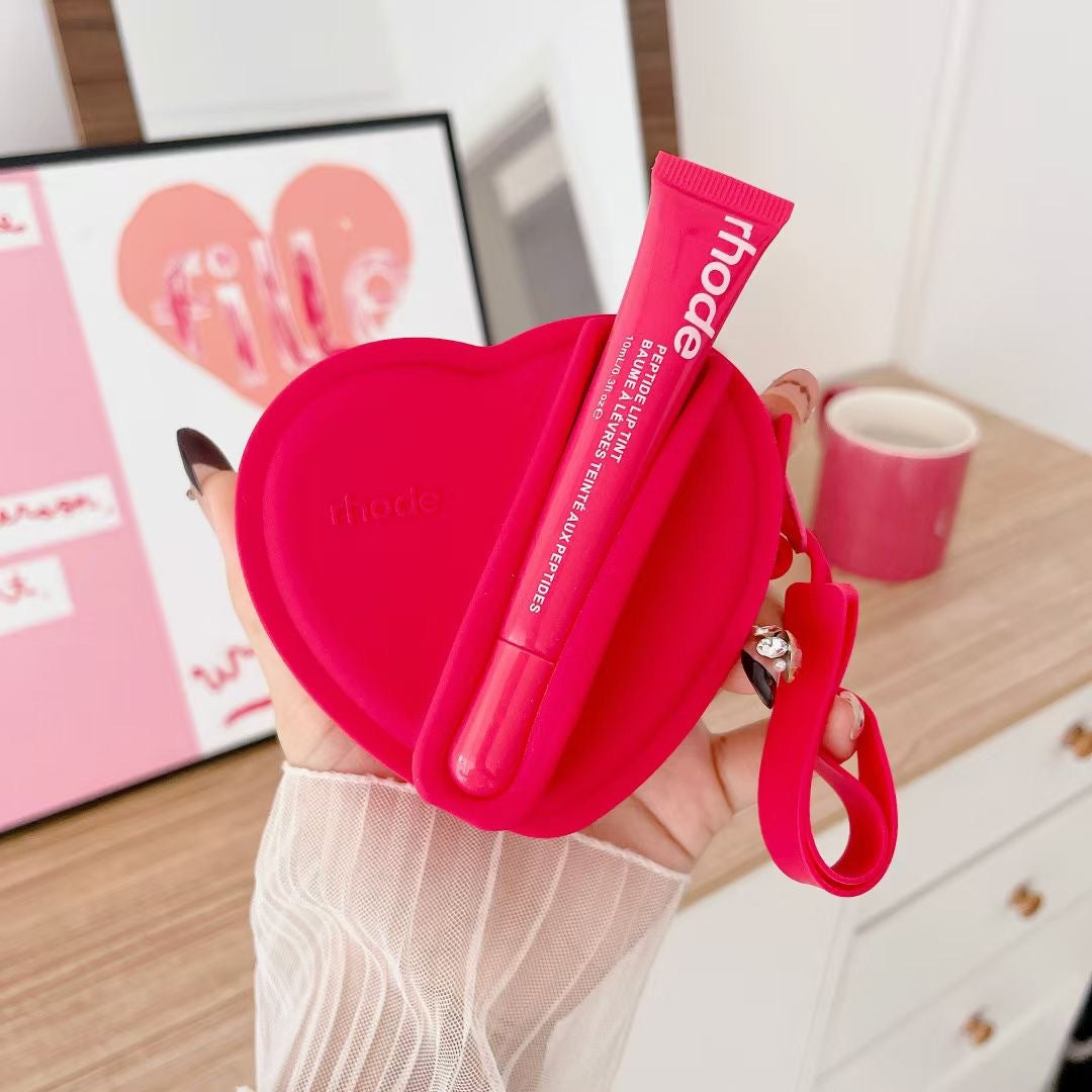 Portable coin purse with earphone compartment