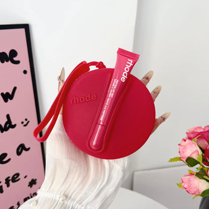 Portable coin purse with earphone compartment