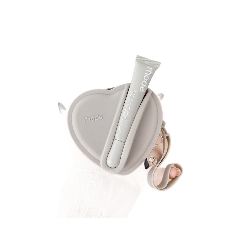 Portable coin purse with earphone compartment