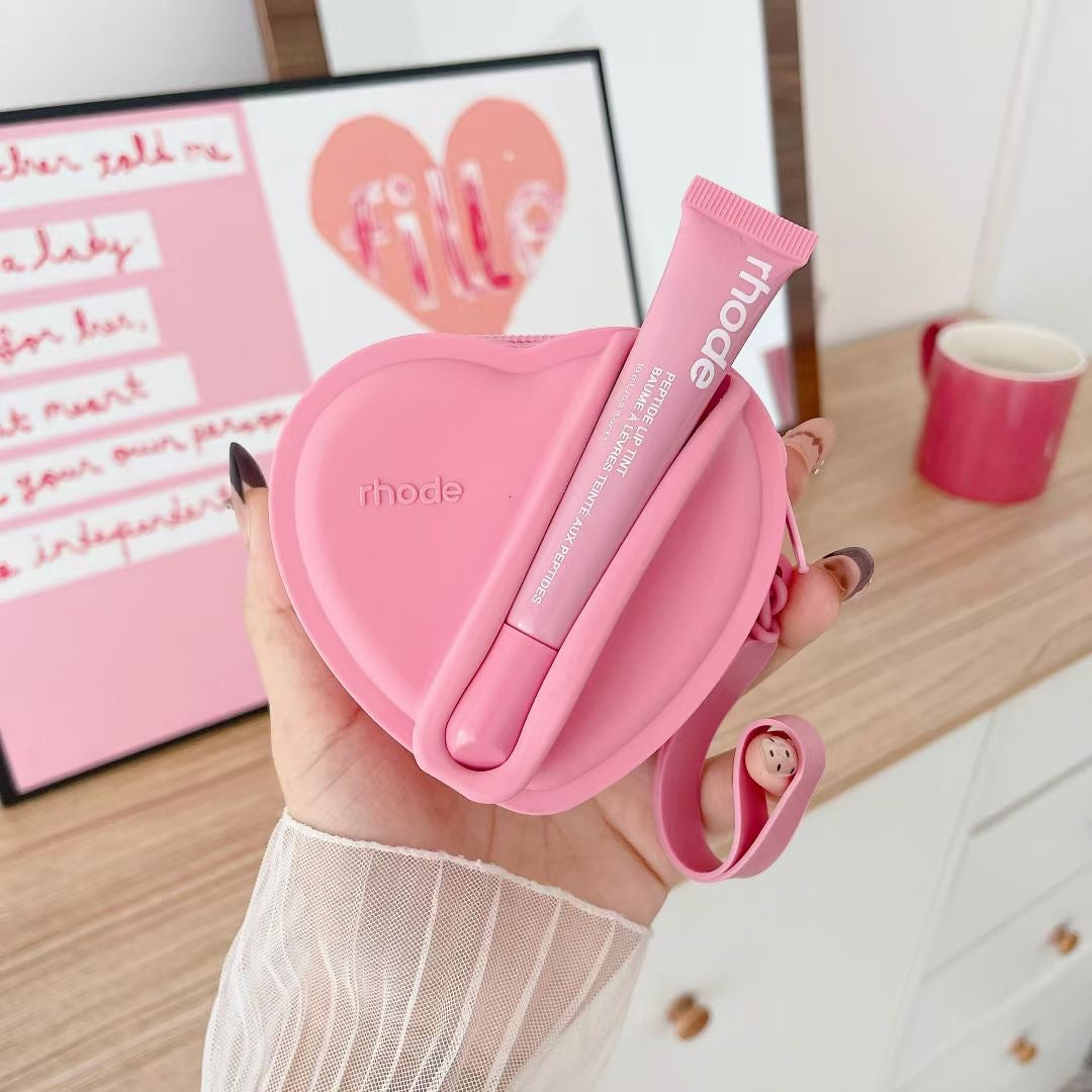 Portable coin purse with earphone compartment