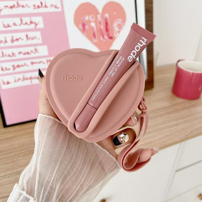 Portable coin purse with earphone compartment