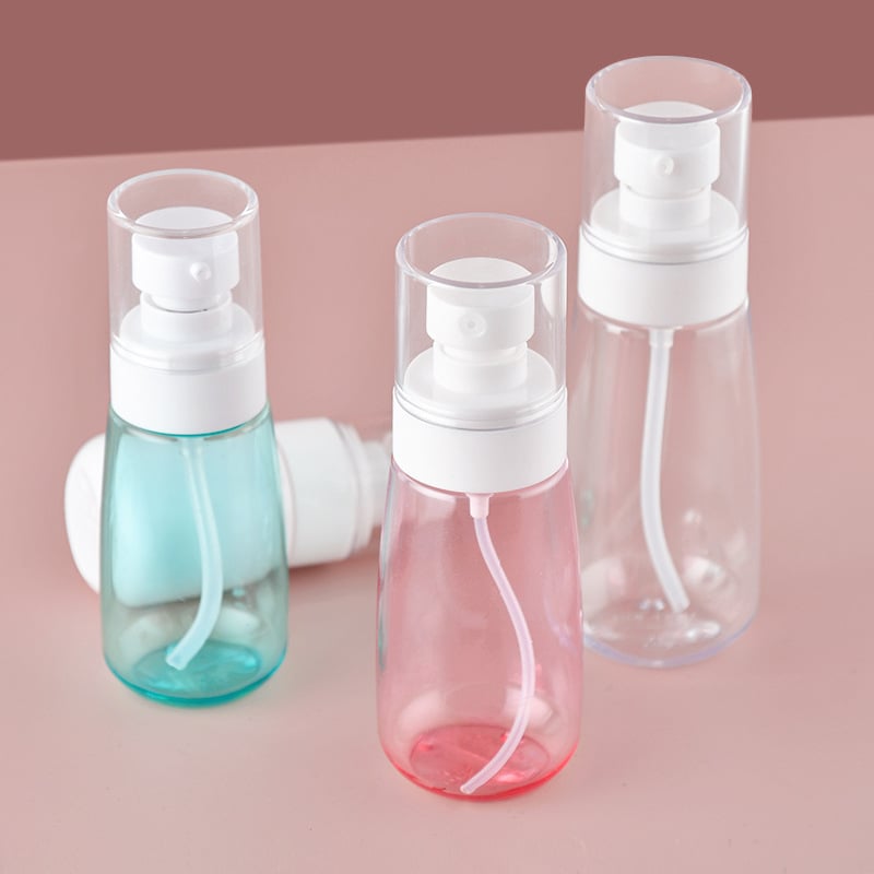 Portable spray bottle for travel dispensing lotion small spray bottle