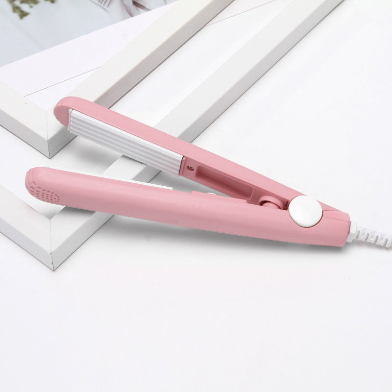 Portable straightener and curling iron