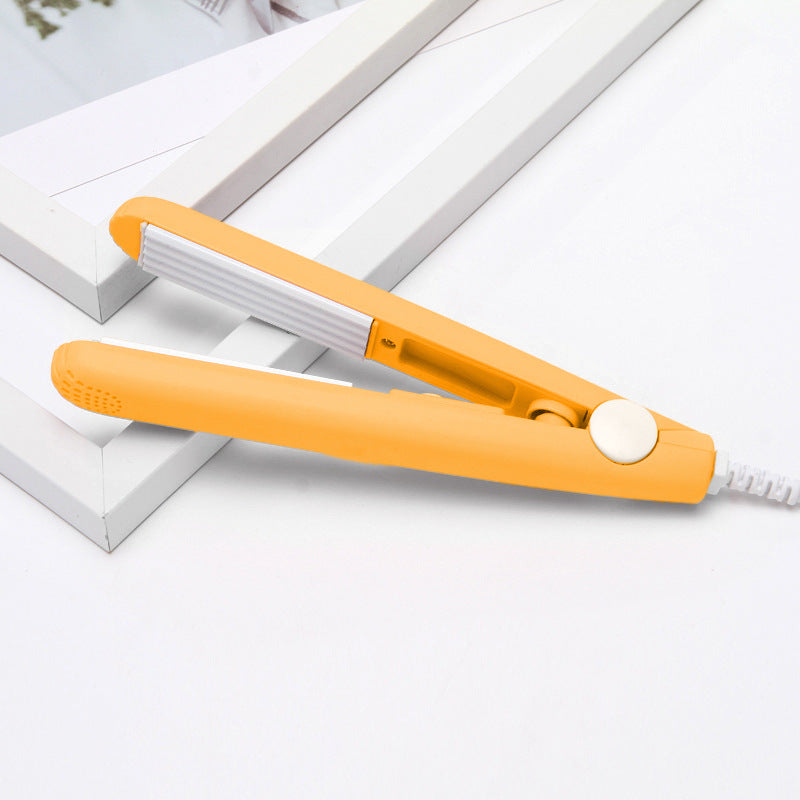 Portable straightener and curling iron