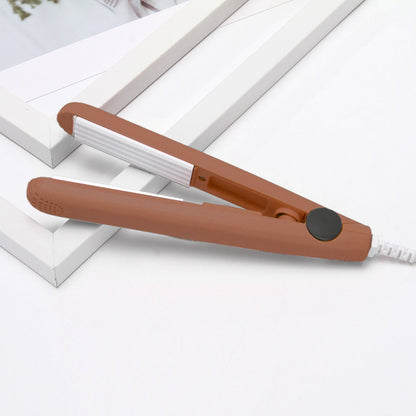 Portable straightener and curling iron
