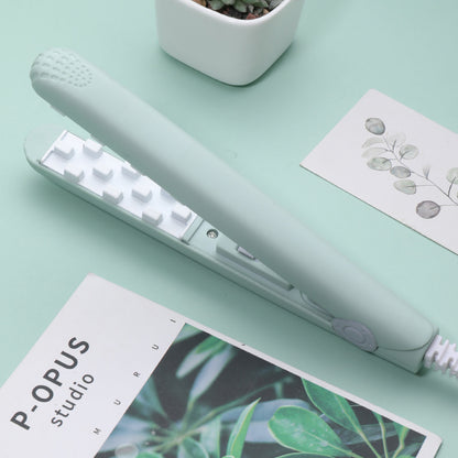 Portable straightener and curling iron