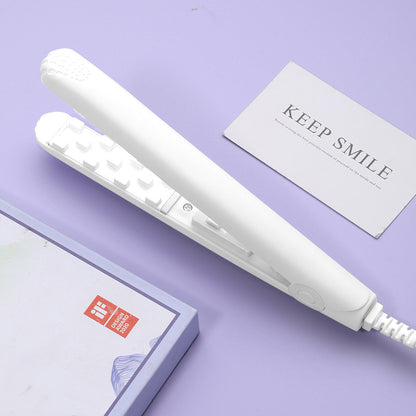 Portable straightener and curling iron