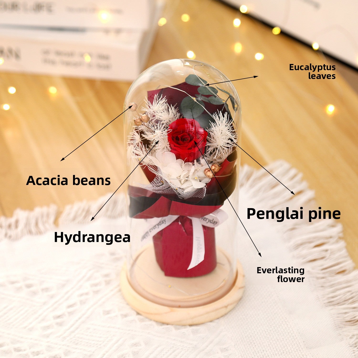 Preserved flower ornament under glass dome